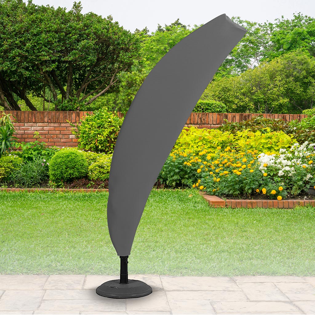 All-weather - Cantilever Cover - Charcoal - placed in a garden on grass with plants behind 