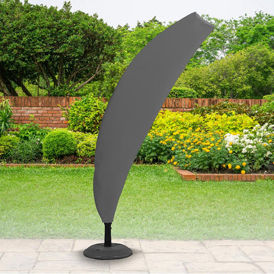 All-weather - Cantilever Cover - Charcoal - placed in a garden on grass with plants behind 