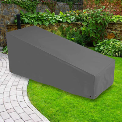 Protector 6000 Sun Lounger Cover Thunder Grey- placed in a garden on grass with plants behind